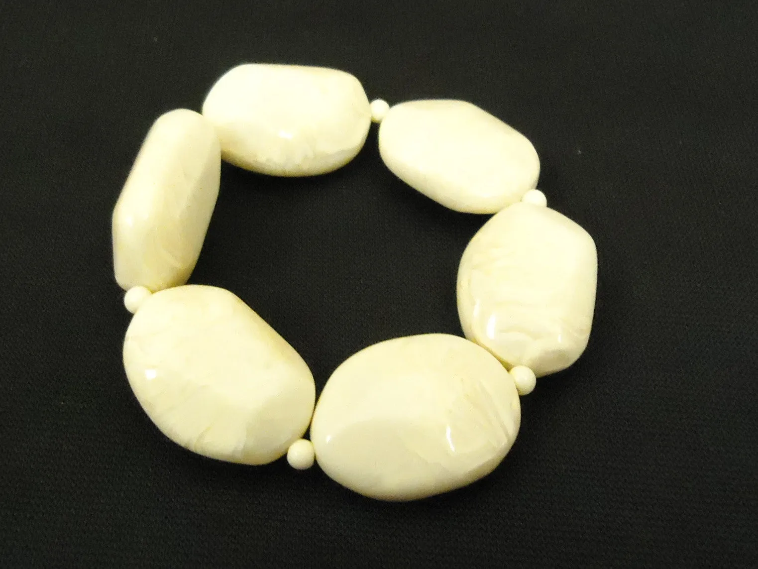 Designer Fashion Bracelet 2in Diameter x 7/8in W Strand/String Plastic Female Adult Beiges -- Used