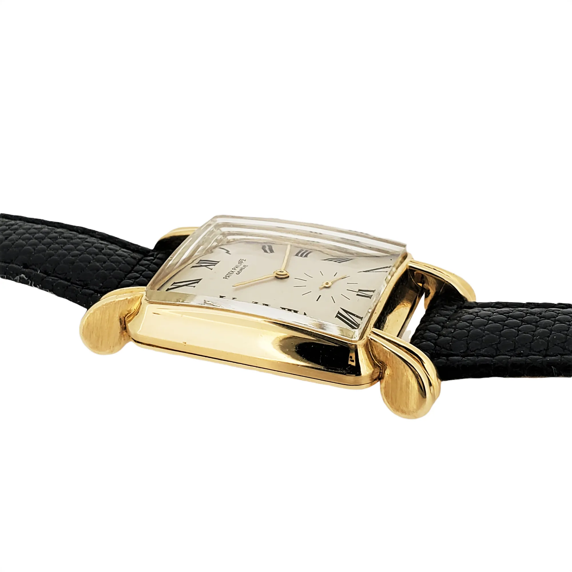 Patek Philippe 2440J,  Massive rectangular shaped case large flared fluted lugs Circa 1949-50